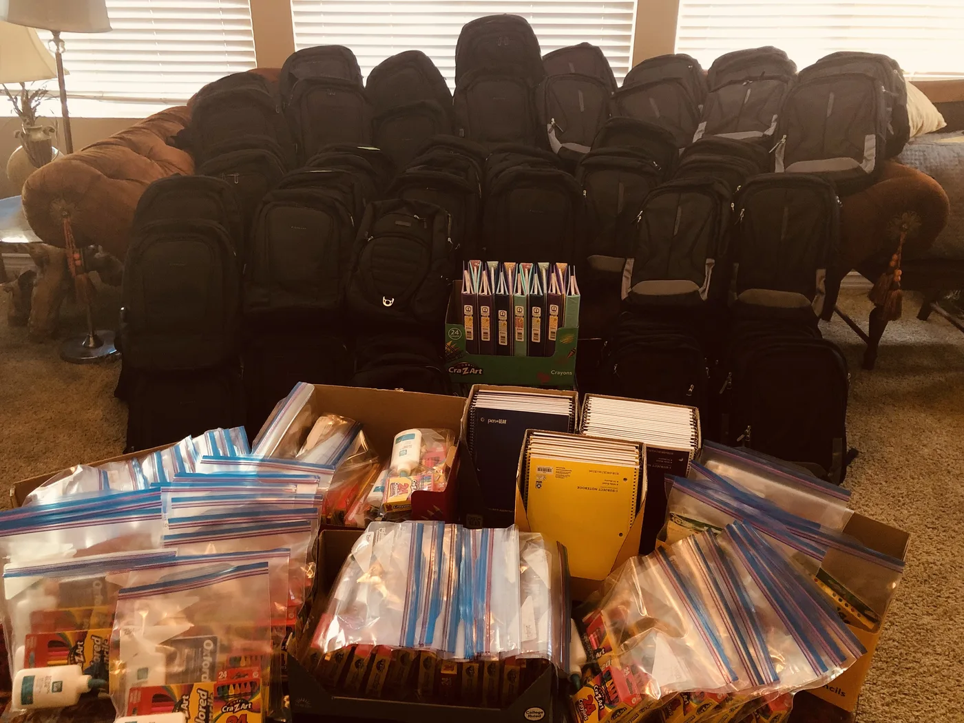 Backpacks and school supplies prepared for Hope 4 You families